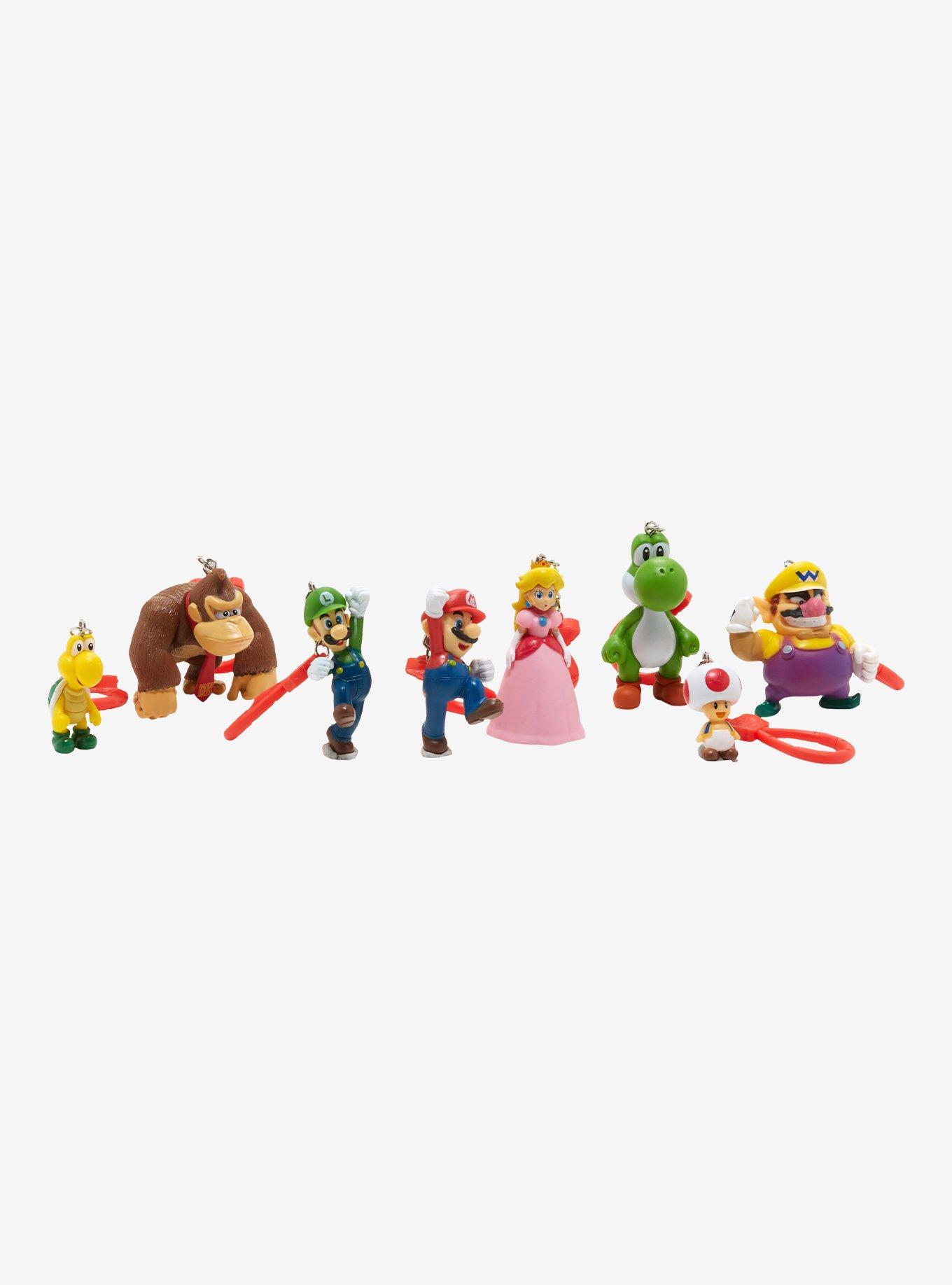 The Super Mario Bros. Movie - 5” Figure Series – Peach Figure with Umbrella  Accessory