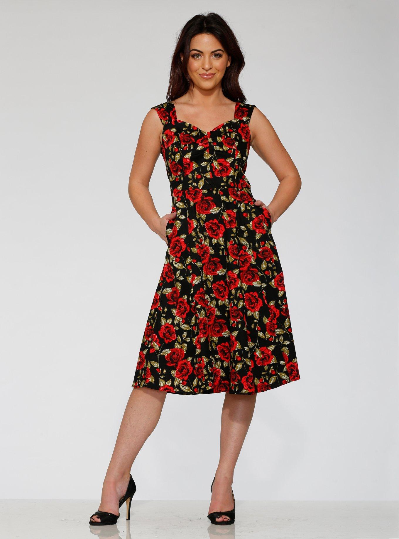 Black dress with red roses best sale on it