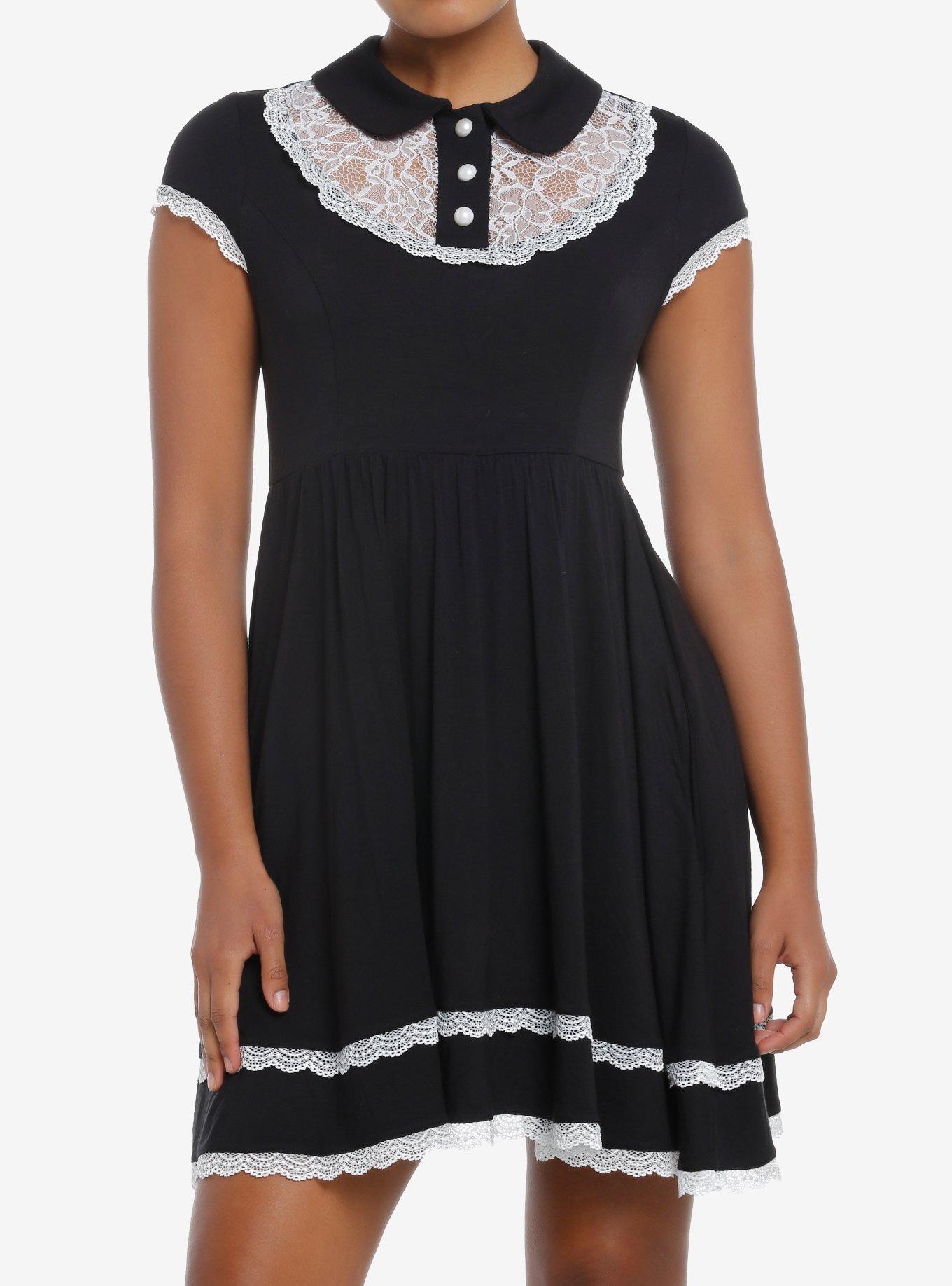 Black and 2025 white babydoll dress