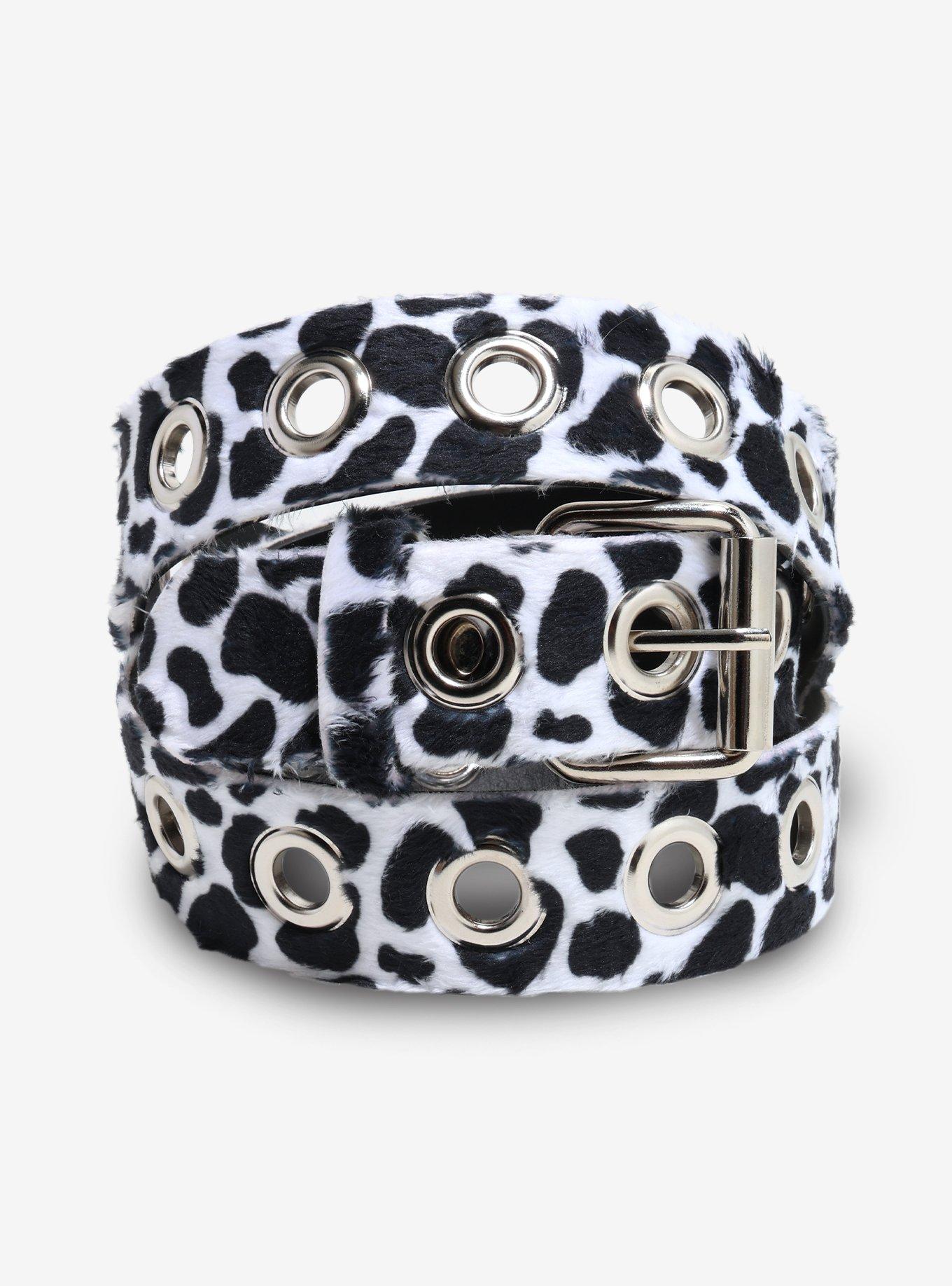 Cow-print fuzzy fabric belt with a single row of silver grommets