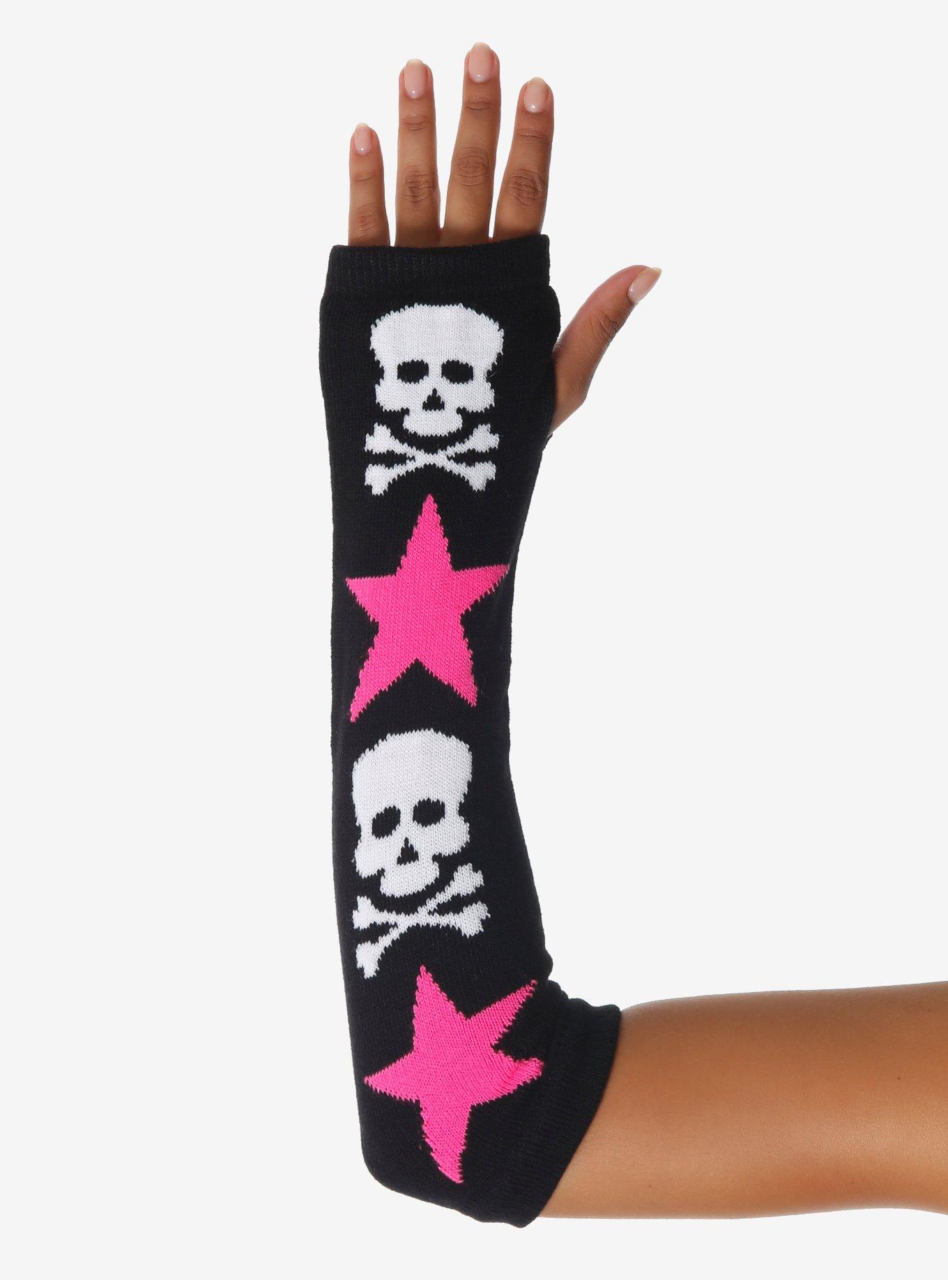 Black arm warmer printed with white skulls and pink stars
