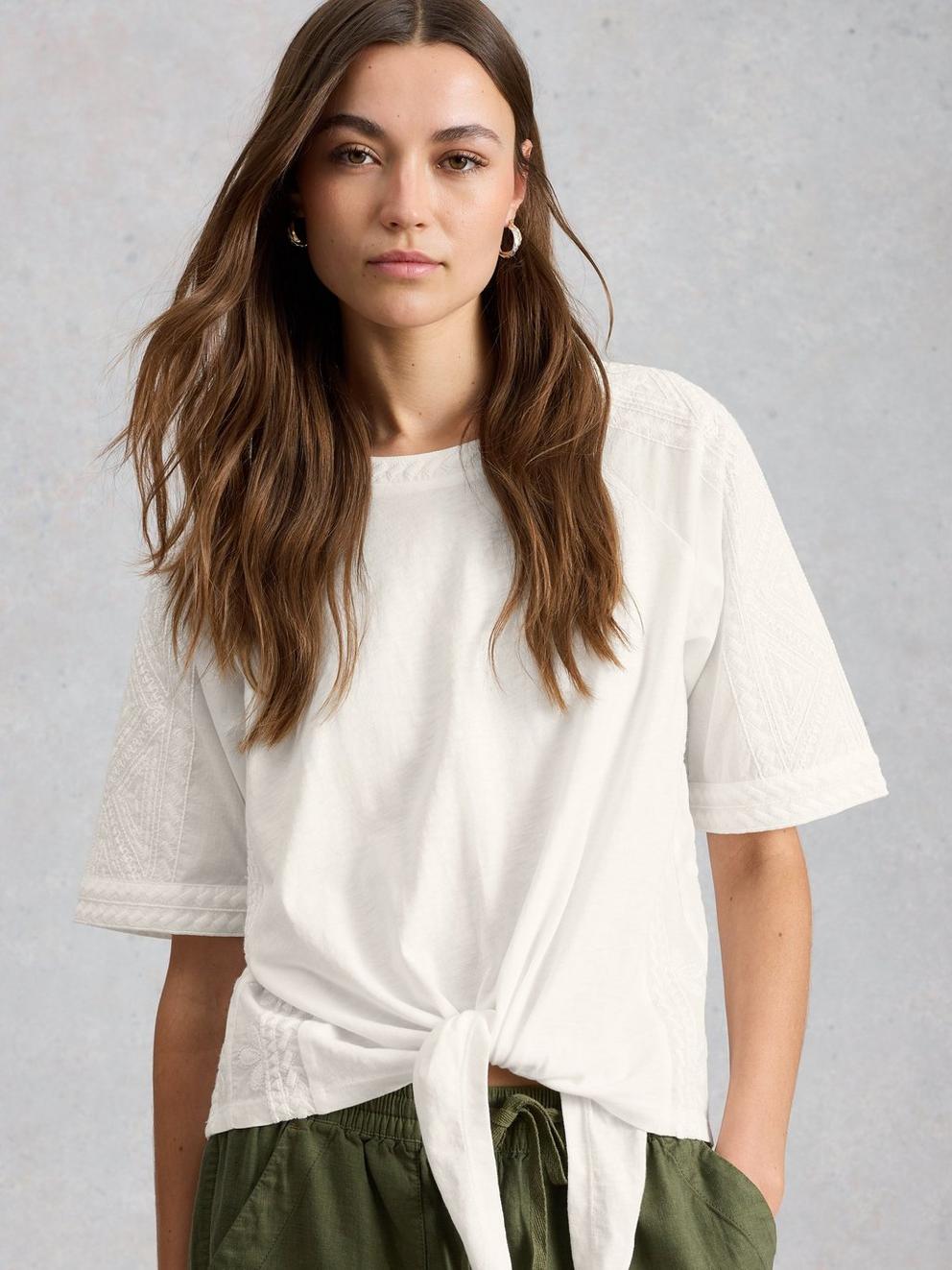 EMBROIDERED TIE HEM CREW NECK TOP