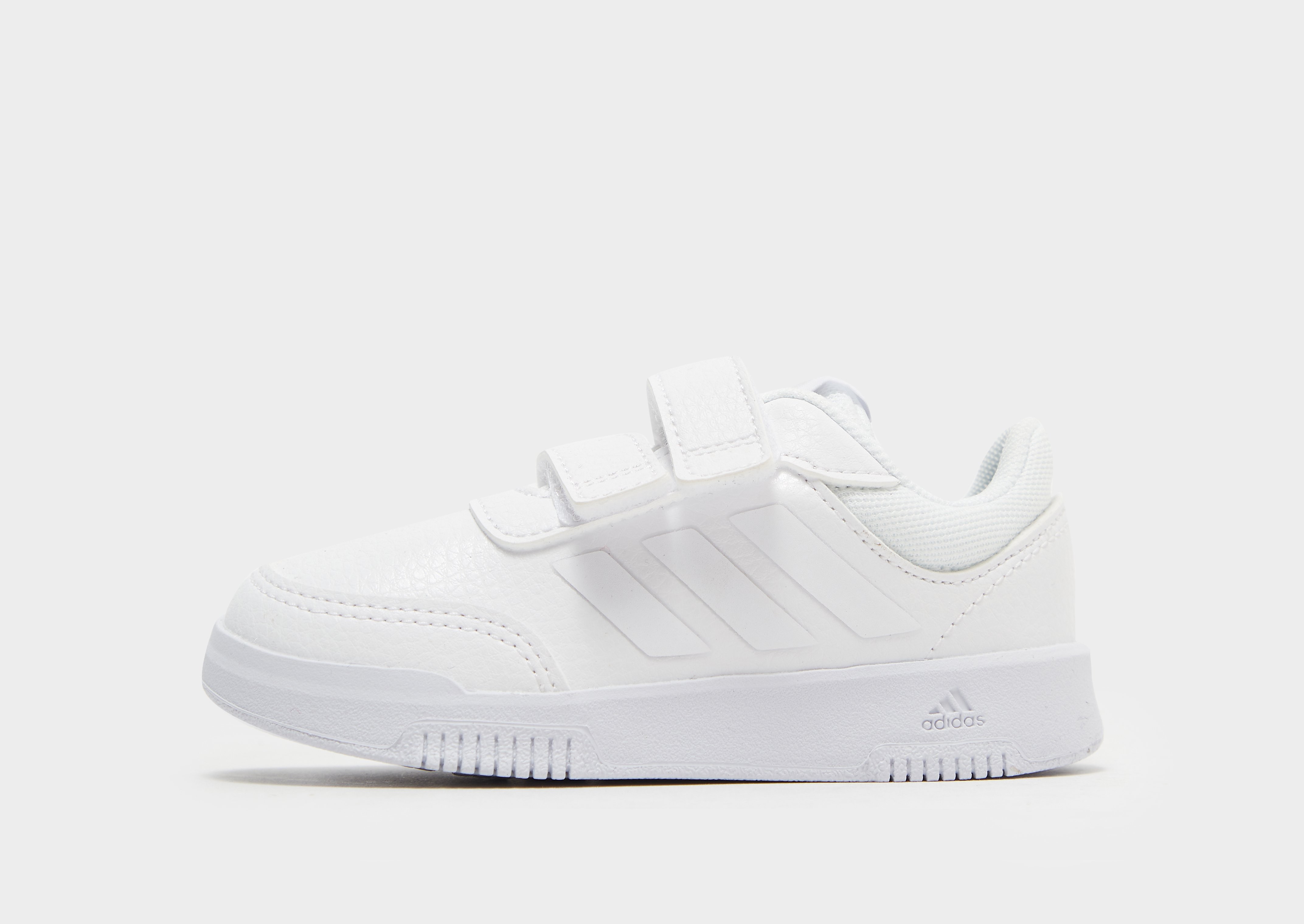 Adidas Tensaur herensneaker zwart en wit