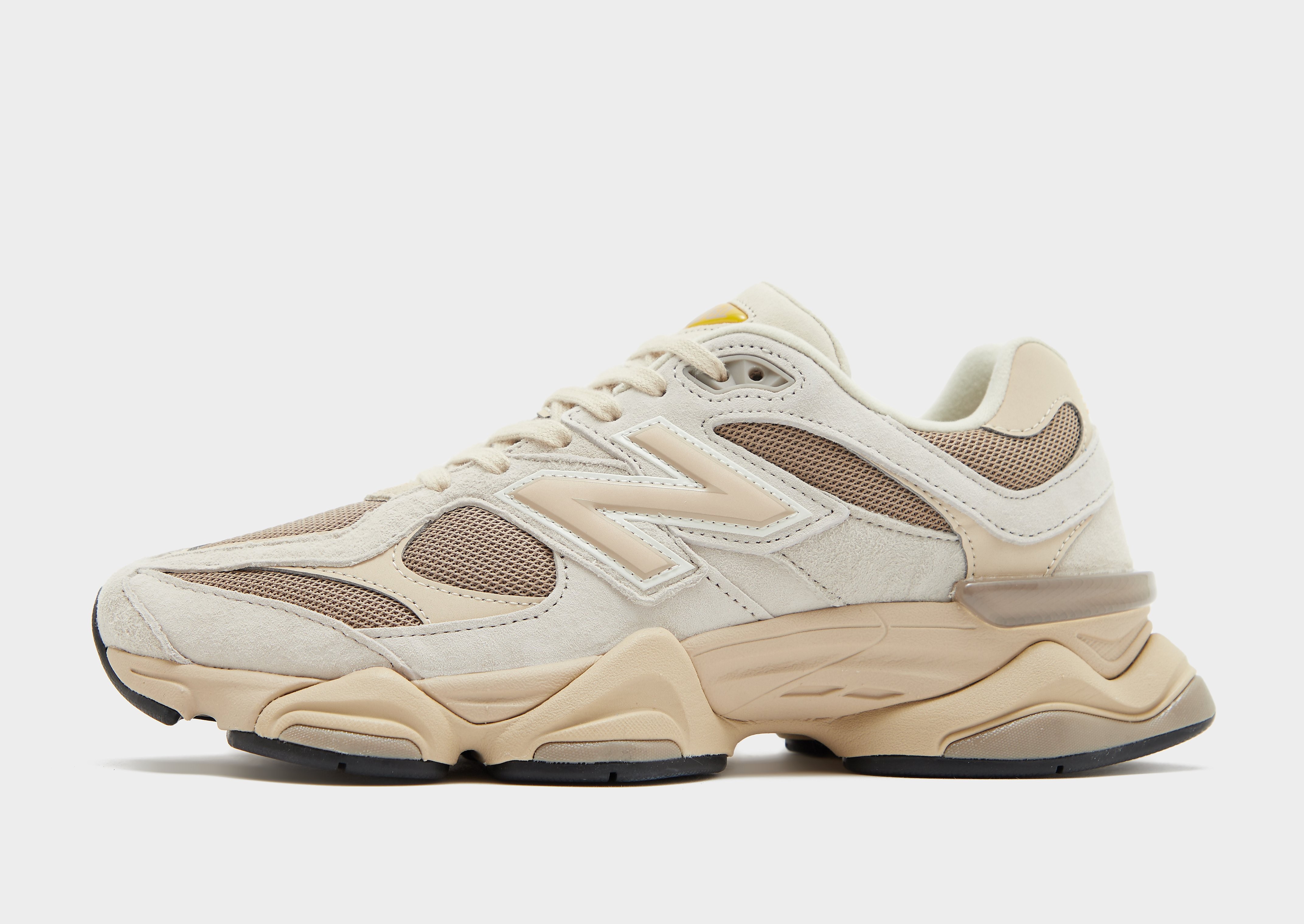 New Balance 9060 herensneaker bruin en oranje