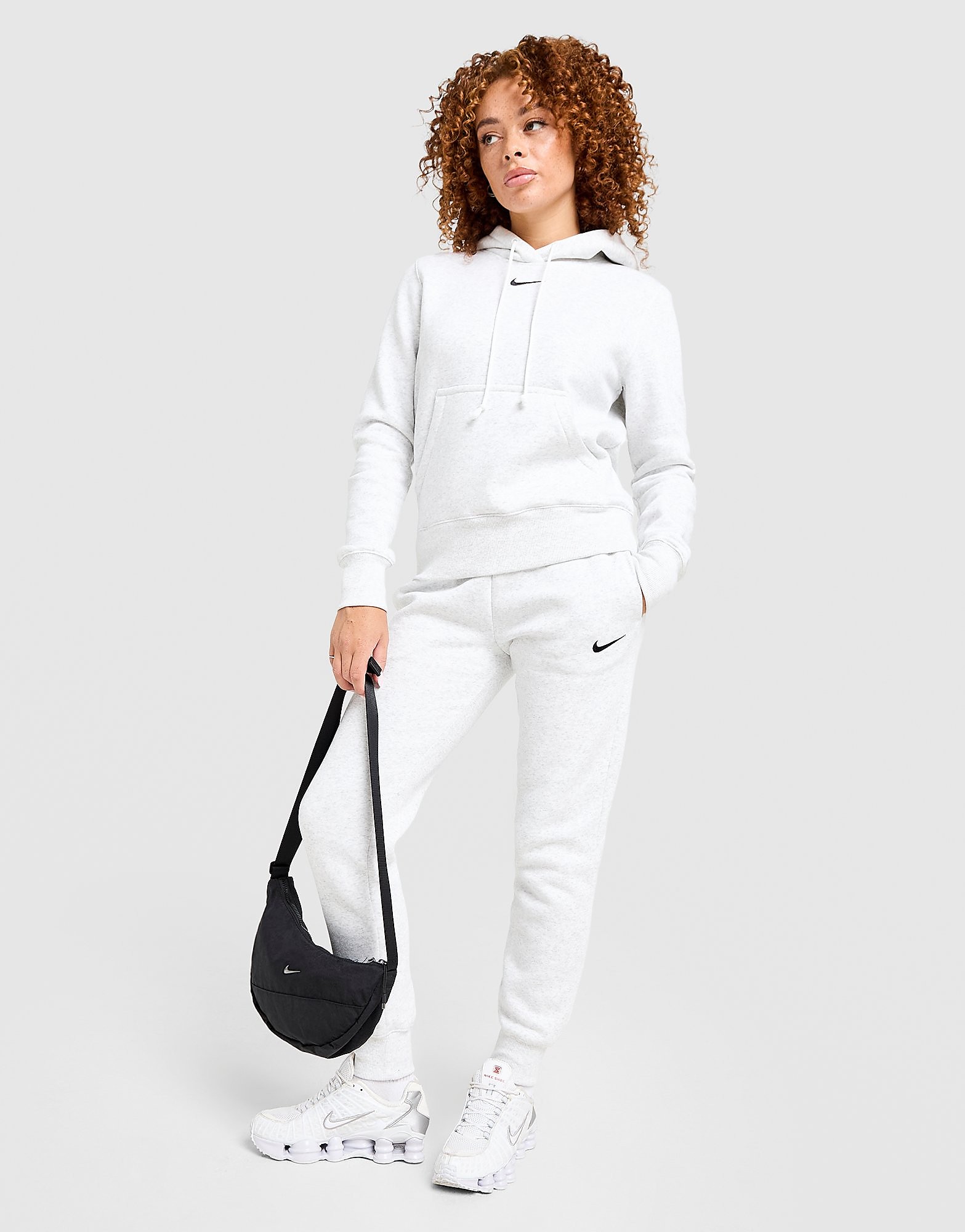 Nike Pantalon de survêtement taille mi haute Phoenix Fleece Femme Medium Soft Medium Soft
