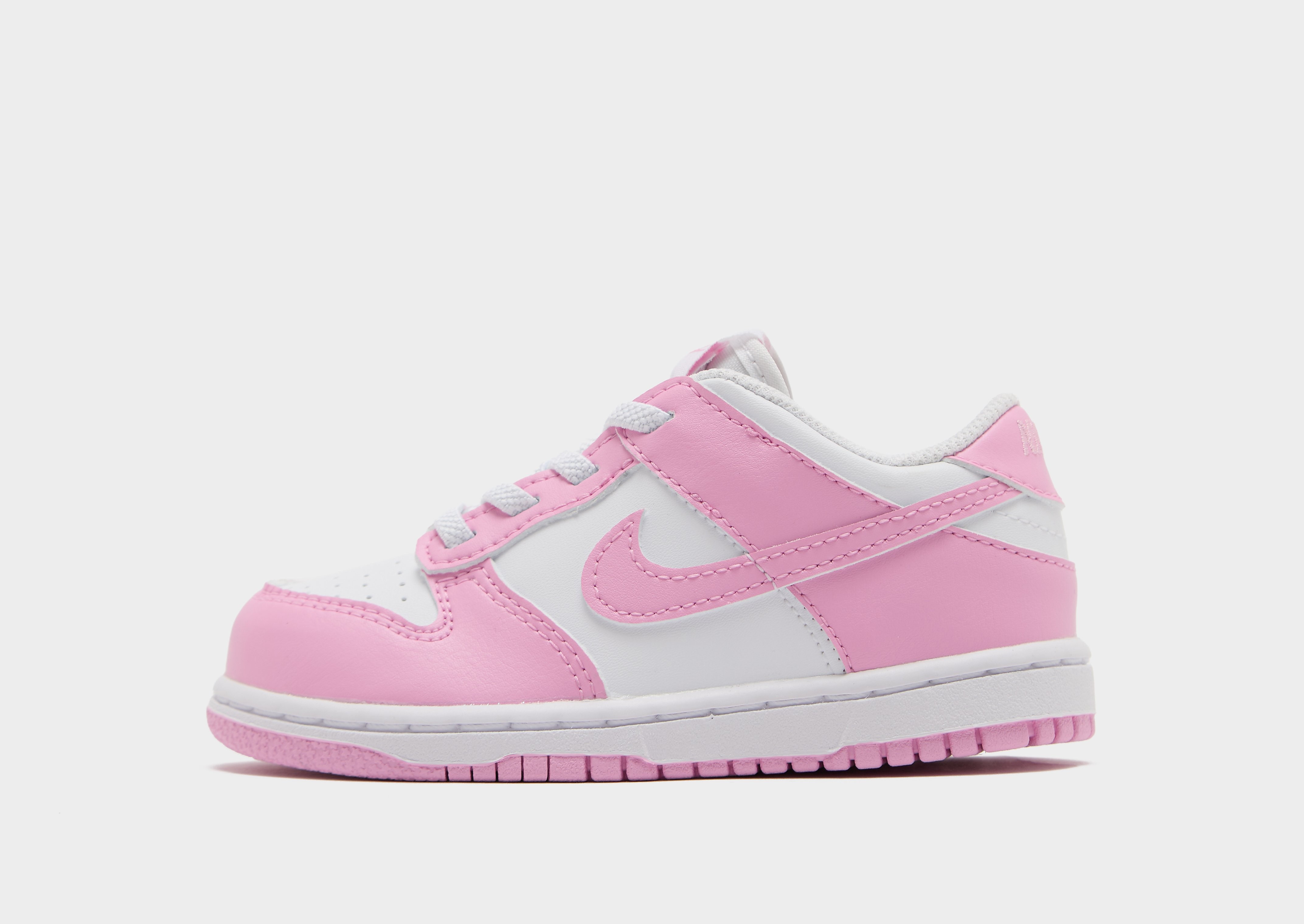 Nike Dunk Low kindersneaker wit en roze