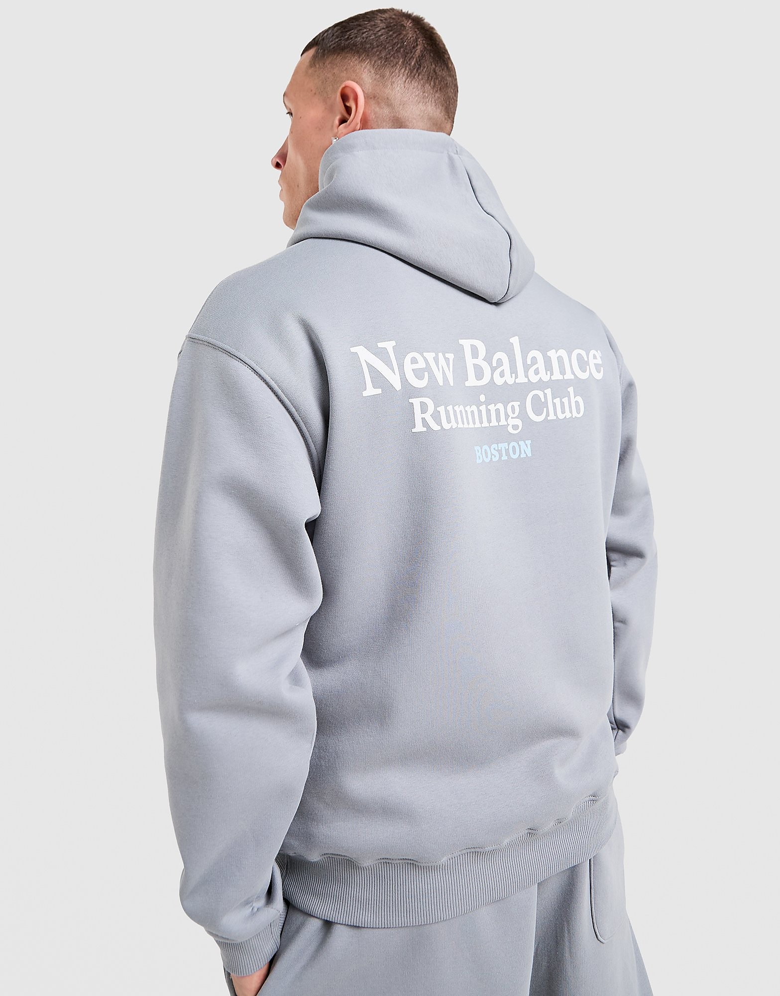 New Balance Felpa con Cappuccio Run Cub, grigio