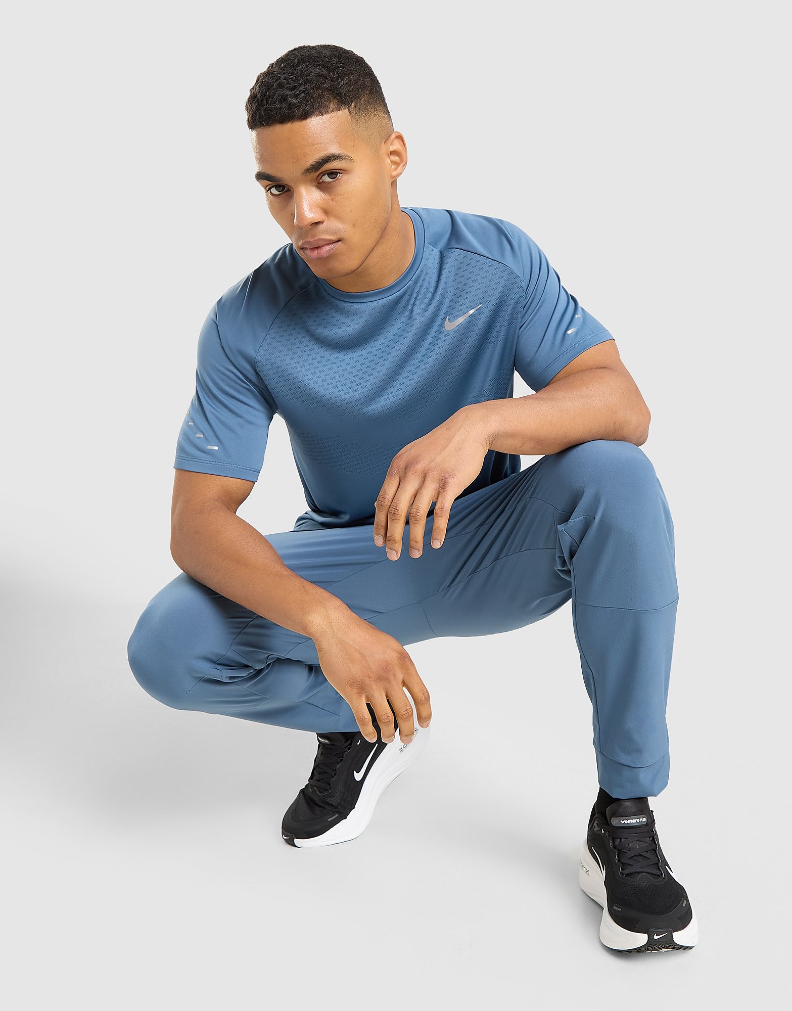 Nike Dri-FIT ADV hardlooptop met korte mouwen voor heren Stride Blauw- Heren Blauw