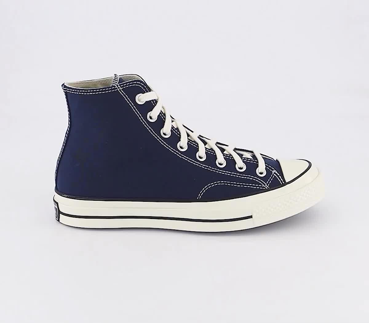 Navy blue store and orange converse