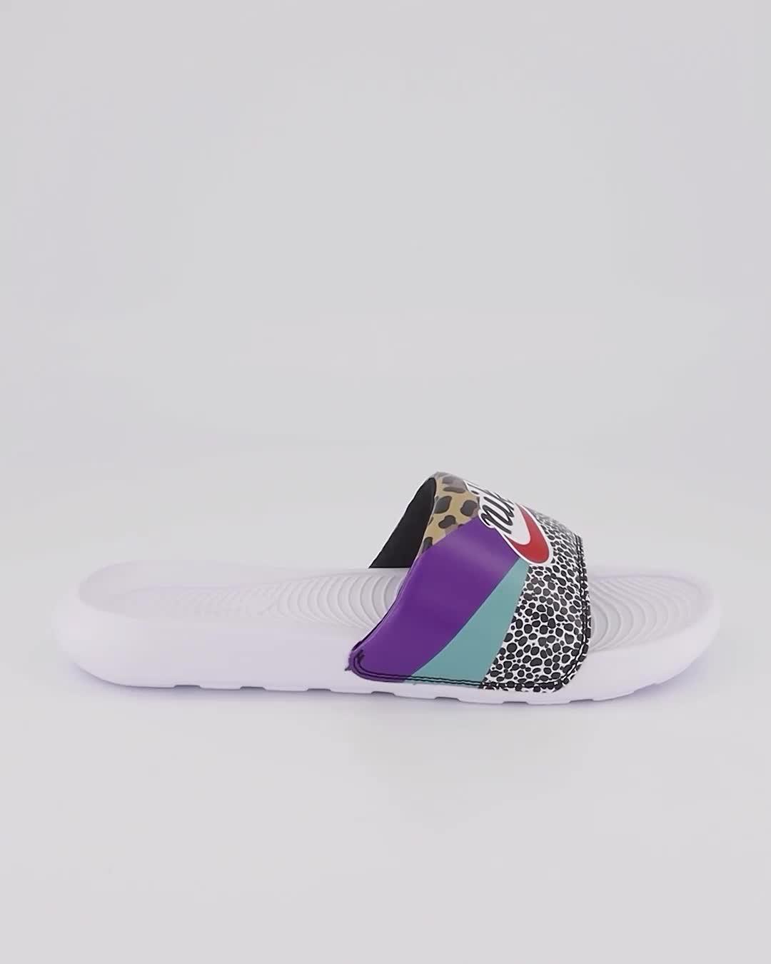 Purple nike shop flip flops