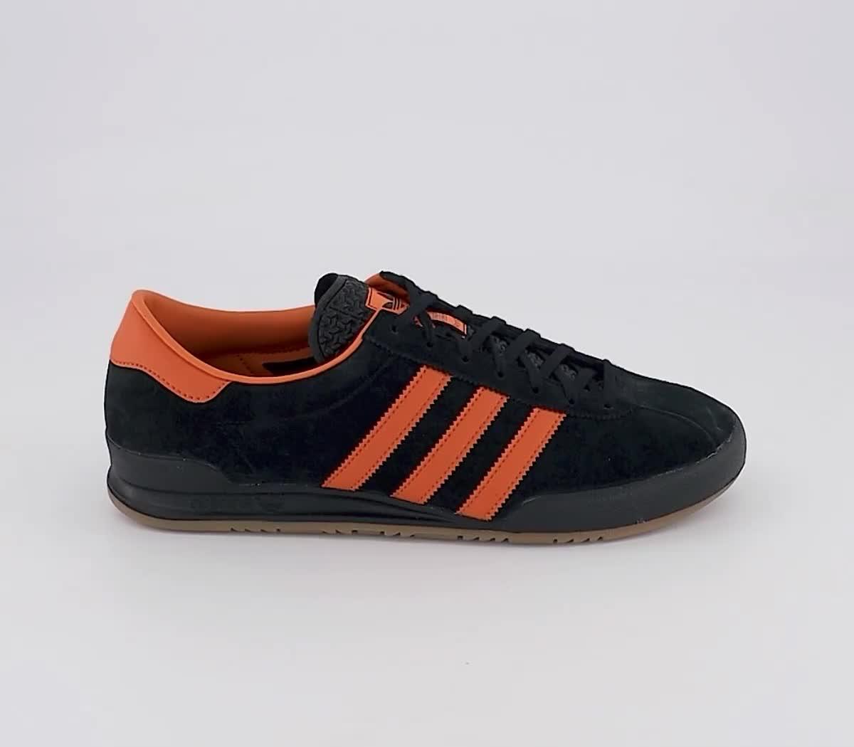 Adidas jeans trainers 2025 black and orange